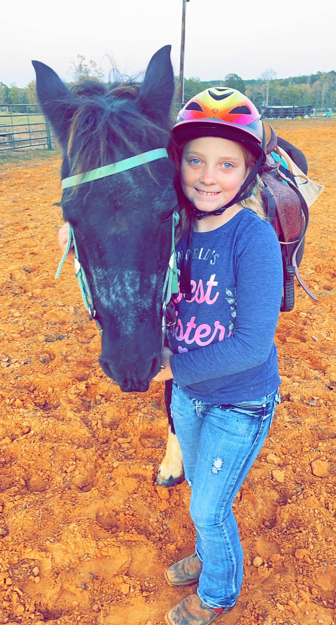 Layla is registered to the contest to win money with this photo: bridle, cool, equestrianism, fun, happy, head, headgear, headwear, horse, horse_supplies, horse_tack, jeans, joy, landscape, people, people_in_nature, person, photograph, rein, saddle