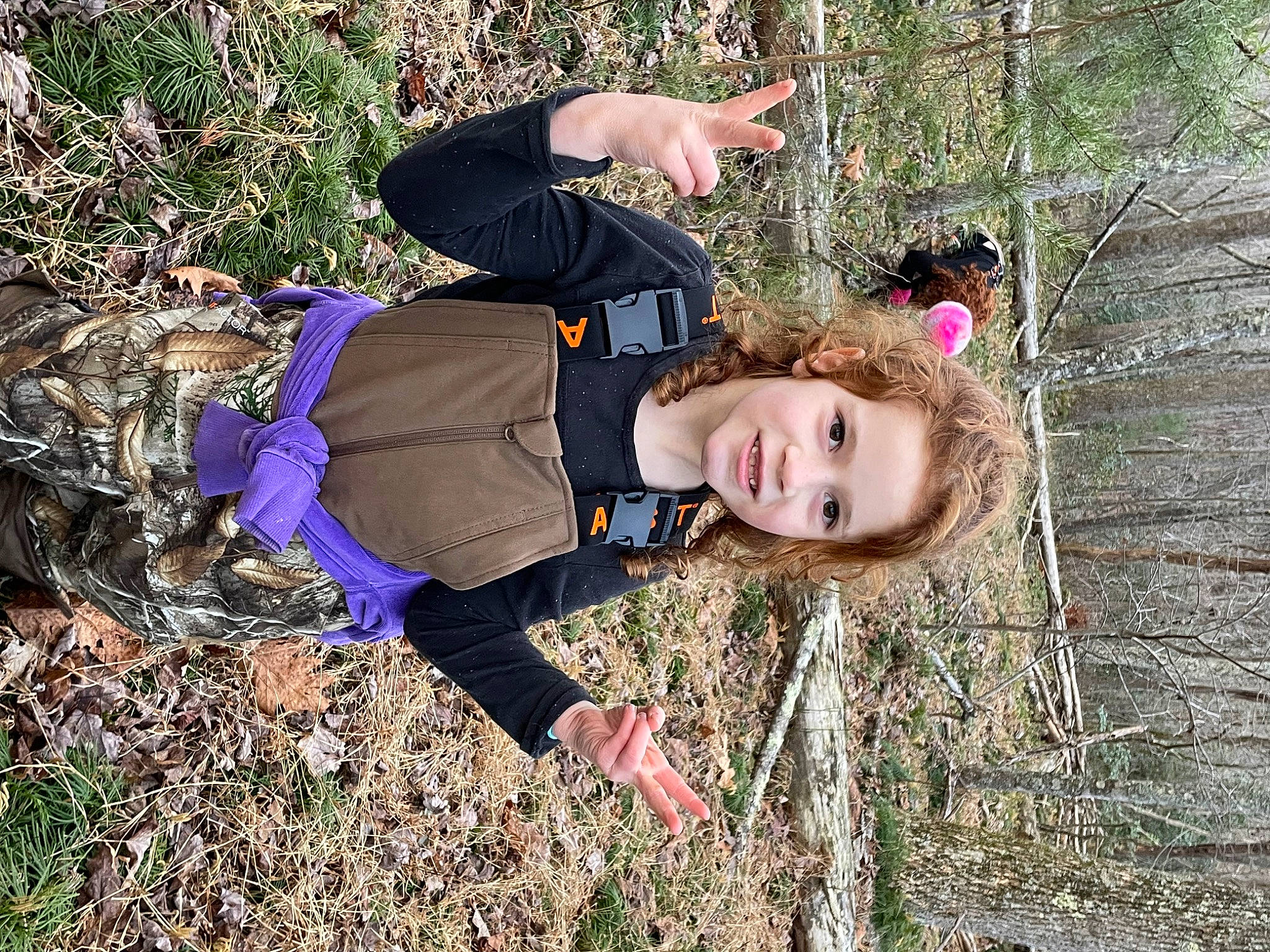 Lauryn is registered to the contest to win money with this photo: fawn, forest, fun, grass, grass_family, grassland, happy, joy, landscape, leisure, natural_landscape, people_in_nature, person, plant, recreation, smile, soil, tree, wood, woodland