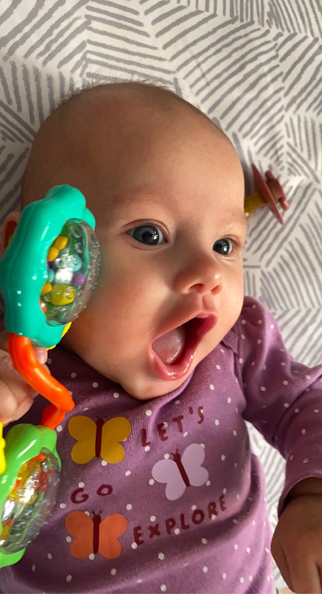 Ember is registered to the contest to win money with this photo: baby, baby_toddler_clothing, cheek, chin, cool, ear, eye, eyebrow, eyelash, face, head, iris, lip, mouth, neck, nose, person, pink, skin, sleeve