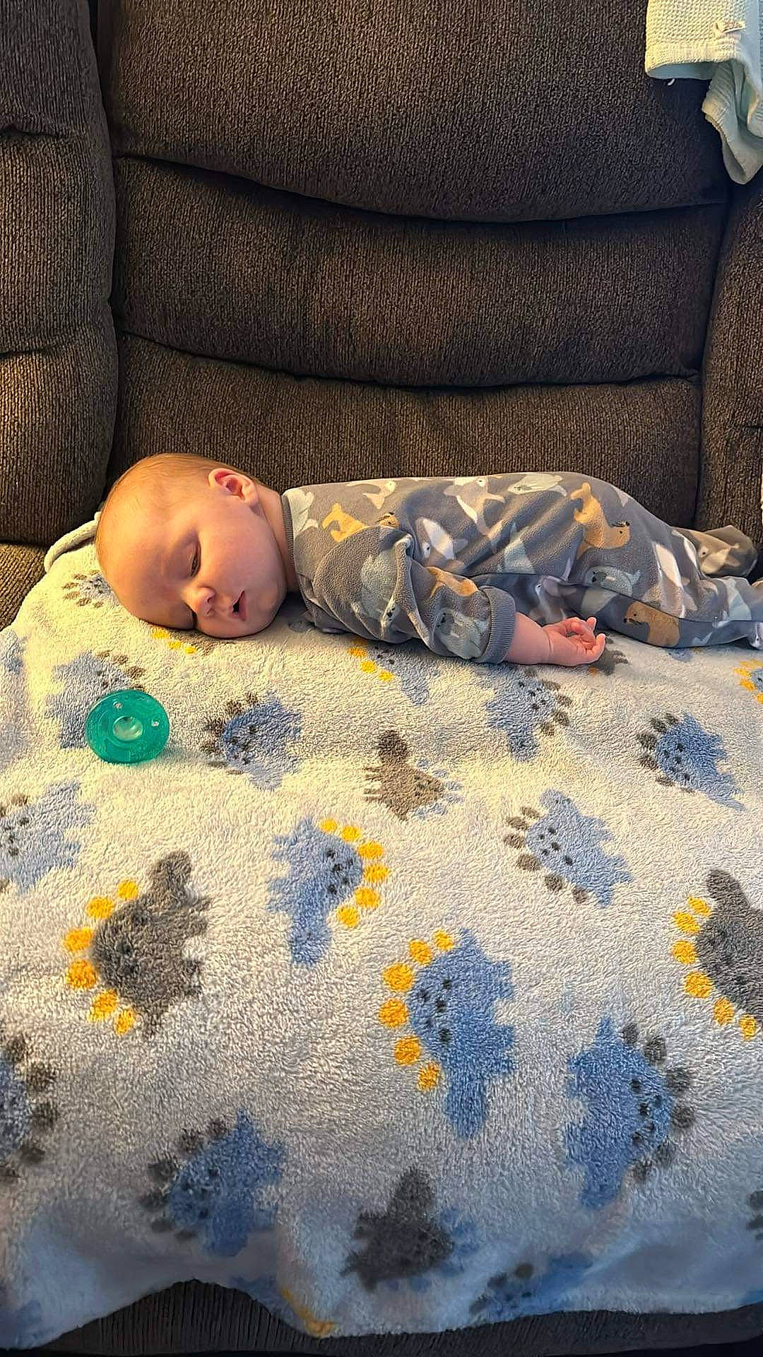 Waylon is registered to the contest to win money with this photo: art, baby, baby_sleeping, baby_toddler_clothing, bedding, bedtime, child, cloud, comfort, cool, face, floor, flooring, linens, pattern, person, room, textile, tints_and_shades, toddler