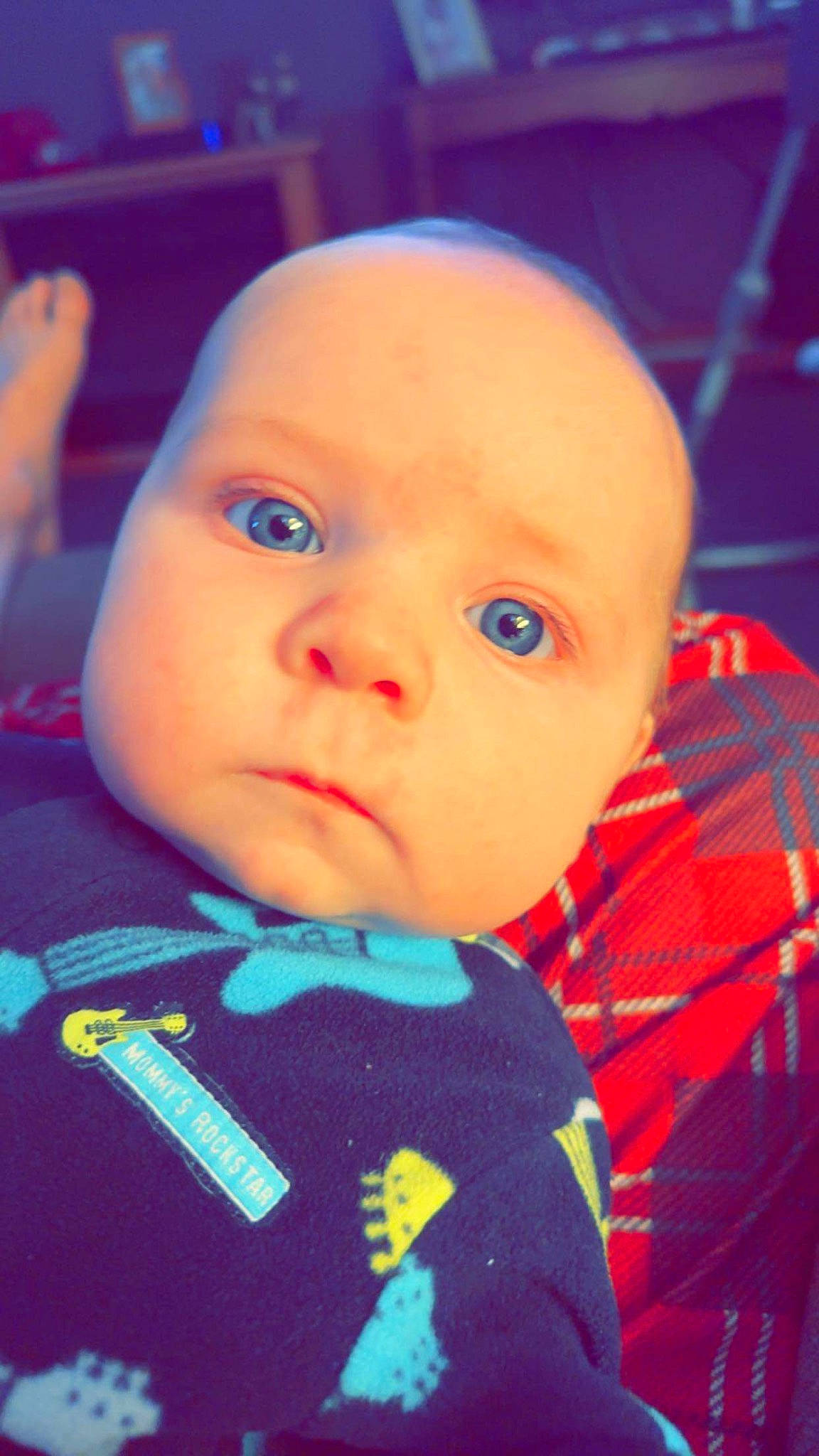 Waylon is registered to the contest to win money with this photo: baby, baby_toddler_clothing, cheek, collar, cool, ear, eye, eyebrow, eyelash, forehead, happy, human_body, iris, lip, mouth, nose, person, skin, sleeve, t_shirt