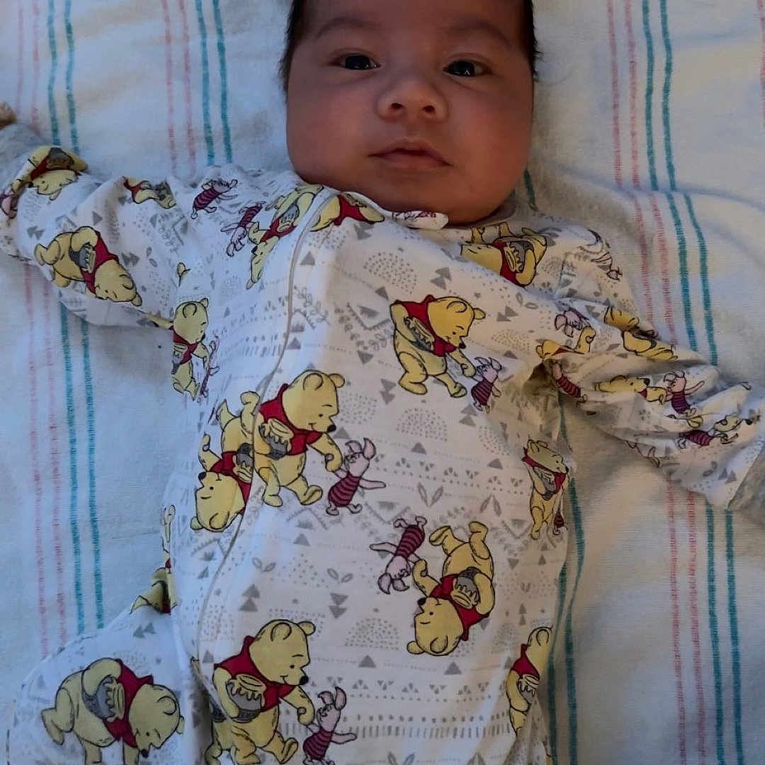 Sebastian joined the competition — help win amazing prizes! baby, bed, bedroom, blanket, clothing, crib, cushion, face, furniture, head, homedecor, indoors, infantbed, newborn, pajamas, person, photography, portrait, quilt, sleeping