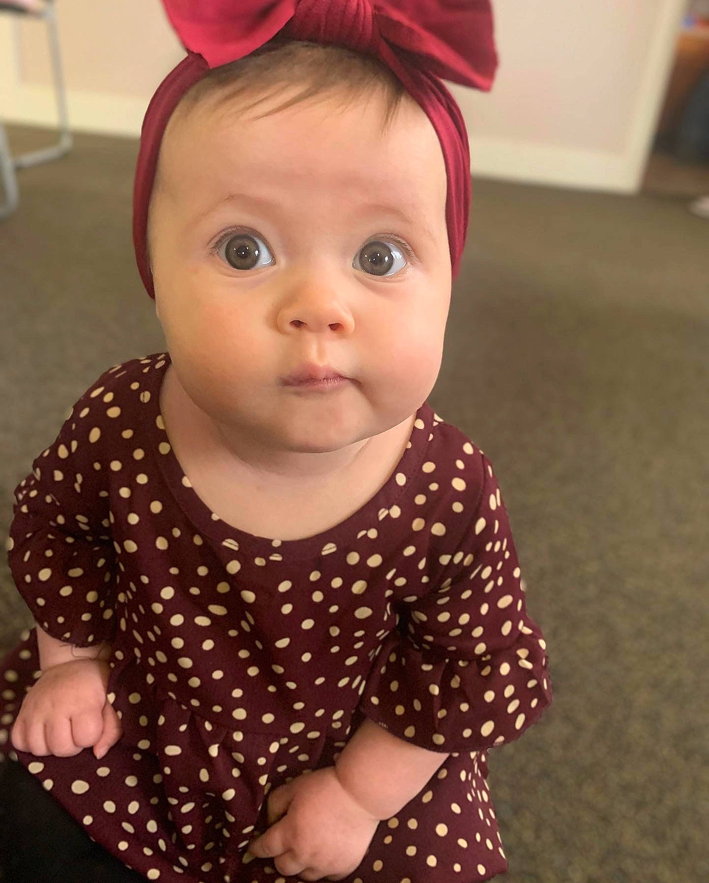 Kynlee is registered to the contest to win money with this photo: baby, baby_toddler_clothing, cap, cheek, child, cool, costume_hat, eyelash, hairstyle, happy, headband, iris, lip, neck, pattern, person, pink, skin, sleeve, surprise