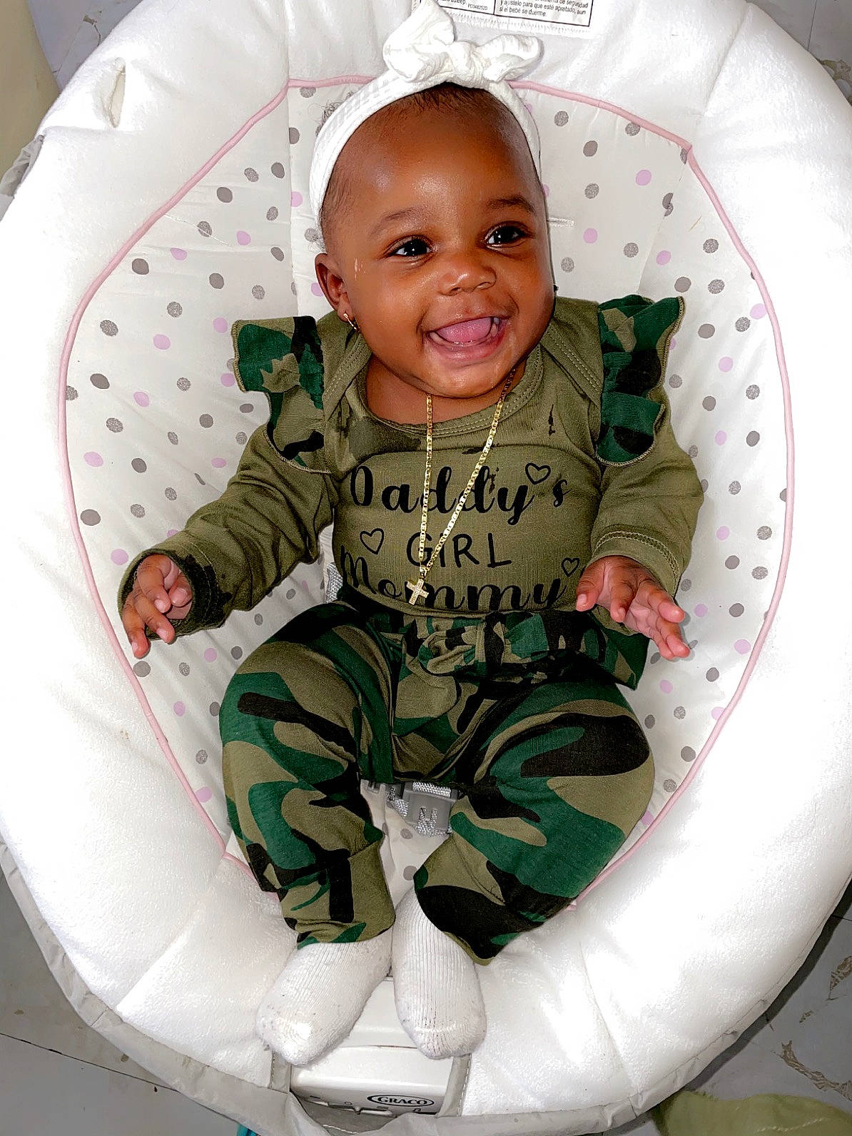 Dior Bates joined the competition — help win amazing prizes! baby, baby_products, baby_toddler_clothing, car_seat, child, circle, comfort, facial_expression, hairstyle, happy, head, joy, lap, organ, oval, person, product, sitting, sleeve, smile
