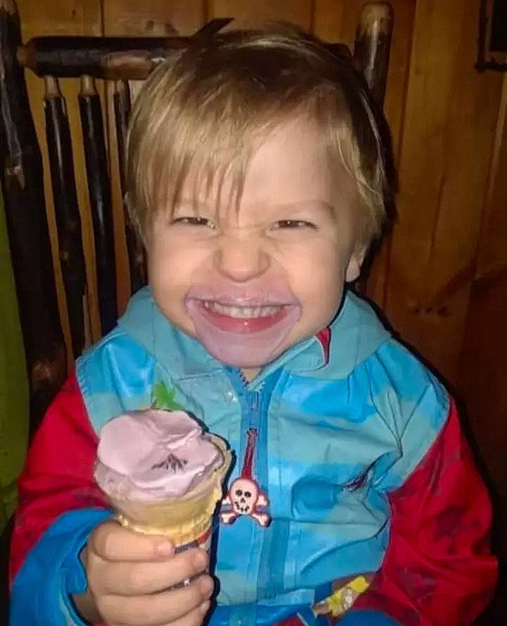 Calogero is registered to the contest to win money with this photo: baby_toddler_clothing, chair, cheek, child, dessert, finger, food, food_craving, frozen_dessert, fun, gelato, happy, ice_cream, ice_cream_cone, ingredient, joy, nose, person, sleeve, smile
