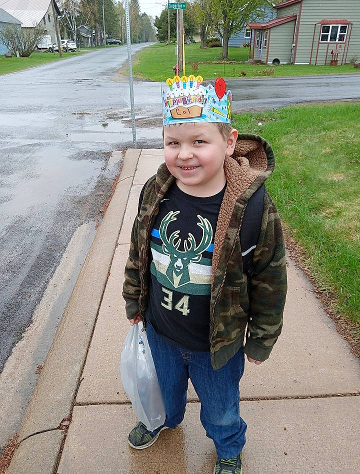 Calogero is registered to the contest to win money with this photo: asphalt, cap, child, electric_blue, event, fashion_accessory, fun, fur, grass, happy, headwear, jewellery, joy, leisure, person, personal_protective_equipment, recreation, road_surface, sleeve, smile