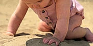 Marnie-Grace joined the competition — help win amazing prizes! baby, child, sand, beach, hat, sunhat, romper, cute, exploring, hands, skin, outdoor, summer, daylight, curious, closeup, crawling, nature, infant, young