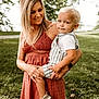 woman, child, toddler, outdoor, park, grass, dress, overalls, shoes, holding, smile, nature, greenery, happy, portrait, people, family, casual, daylight, affection