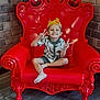 Enzo a rejoint le concours — aidez-le/la à gagner de superbes lots ! barefoot, boy, brick_wall, burger_king_crown, casual_clothing, child, happy, indoor, ornate_chair, peace_sign, person, playful, portrait, red_chair, shirt, shorts, sitting, smiling, throne, tiled_floor