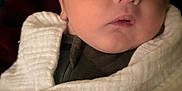 Patrick joined the competition — help win amazing prizes! newborn, baby, blanket, wrapped, face, infant, cozy, soft, portrait, closeup, skin, expression, cute, sleepy, child, warm, indoors, babyclothes, head, peaceful