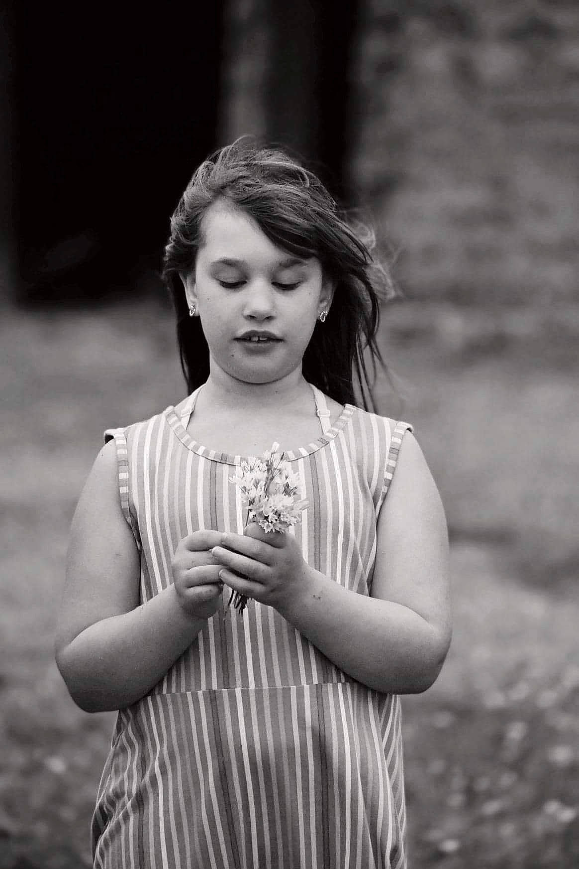 Andrea joined the competition — help win amazing prizes! arm, black_and_white, clothing, day_dress, dress, face, flash_photography, gesture, grass, grey, hand, happy, one_piece_garment, people_in_nature, person, photograph, plant, smile, standing, street_fashion