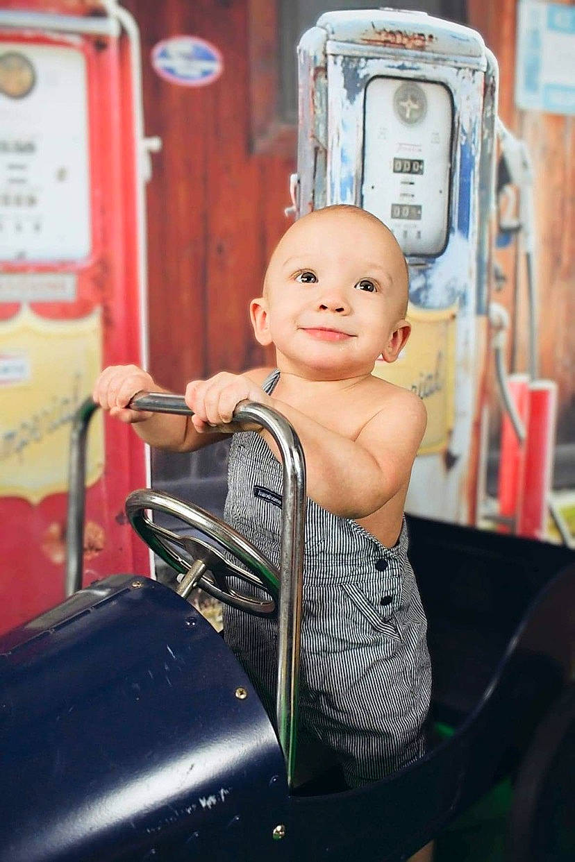 Nathan joined the competition — help win amazing prizes! auto_part, automotive_design, automotive_exterior, bumper, chair, child, doll, fun, gas, happy, joy, leisure, machine, motor_vehicle, person, public_transport, sitting, smile, toddler, toy