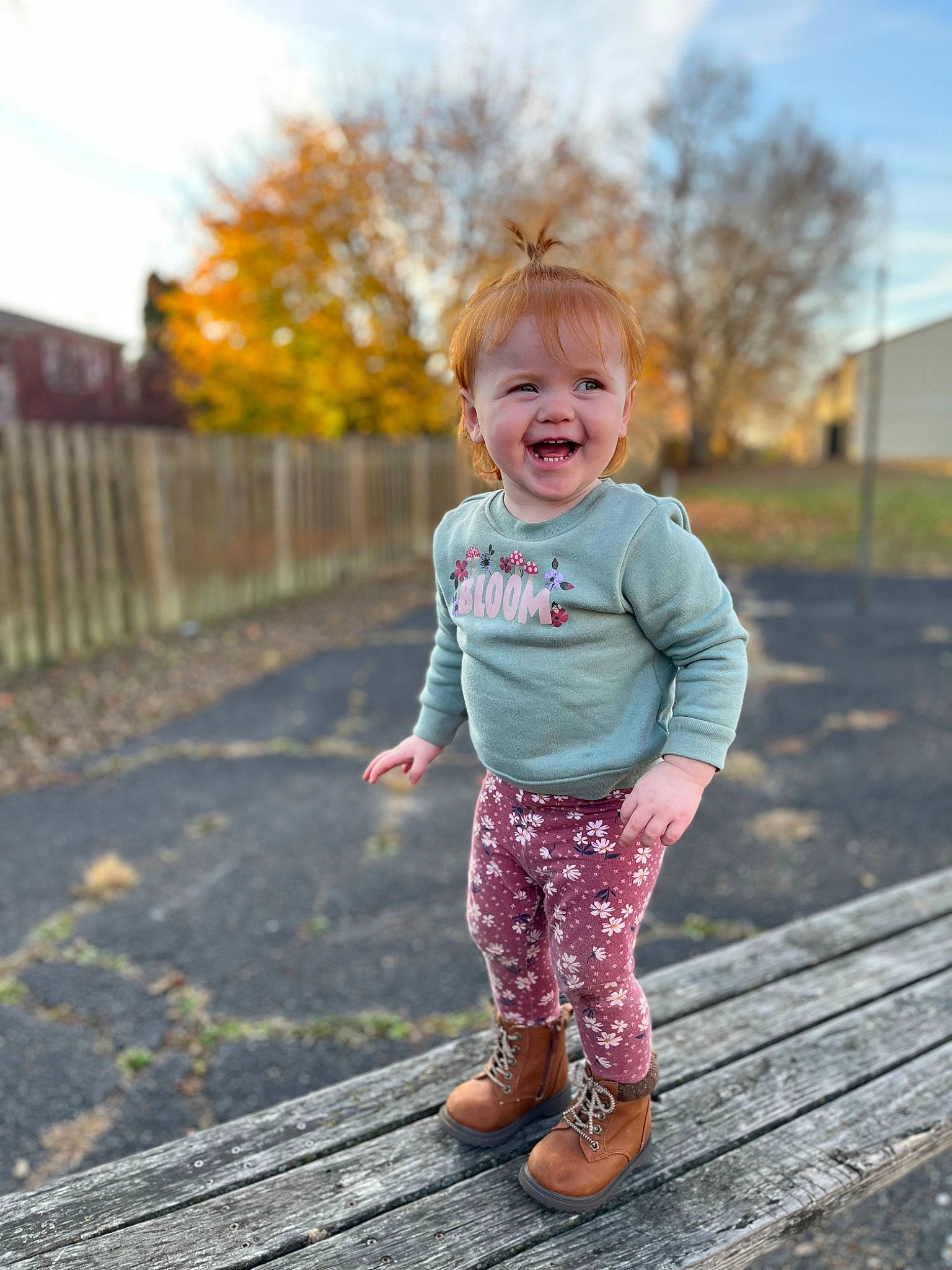 Presleigh is registered to the contest to win money with this photo: baby_toddler_clothing, dress, eye, grass, happy, joy, leaf, leg, leisure, morning, outerwear, people_in_nature, person, plant, sky, sleeve, smile, standing, sunlight, toddler