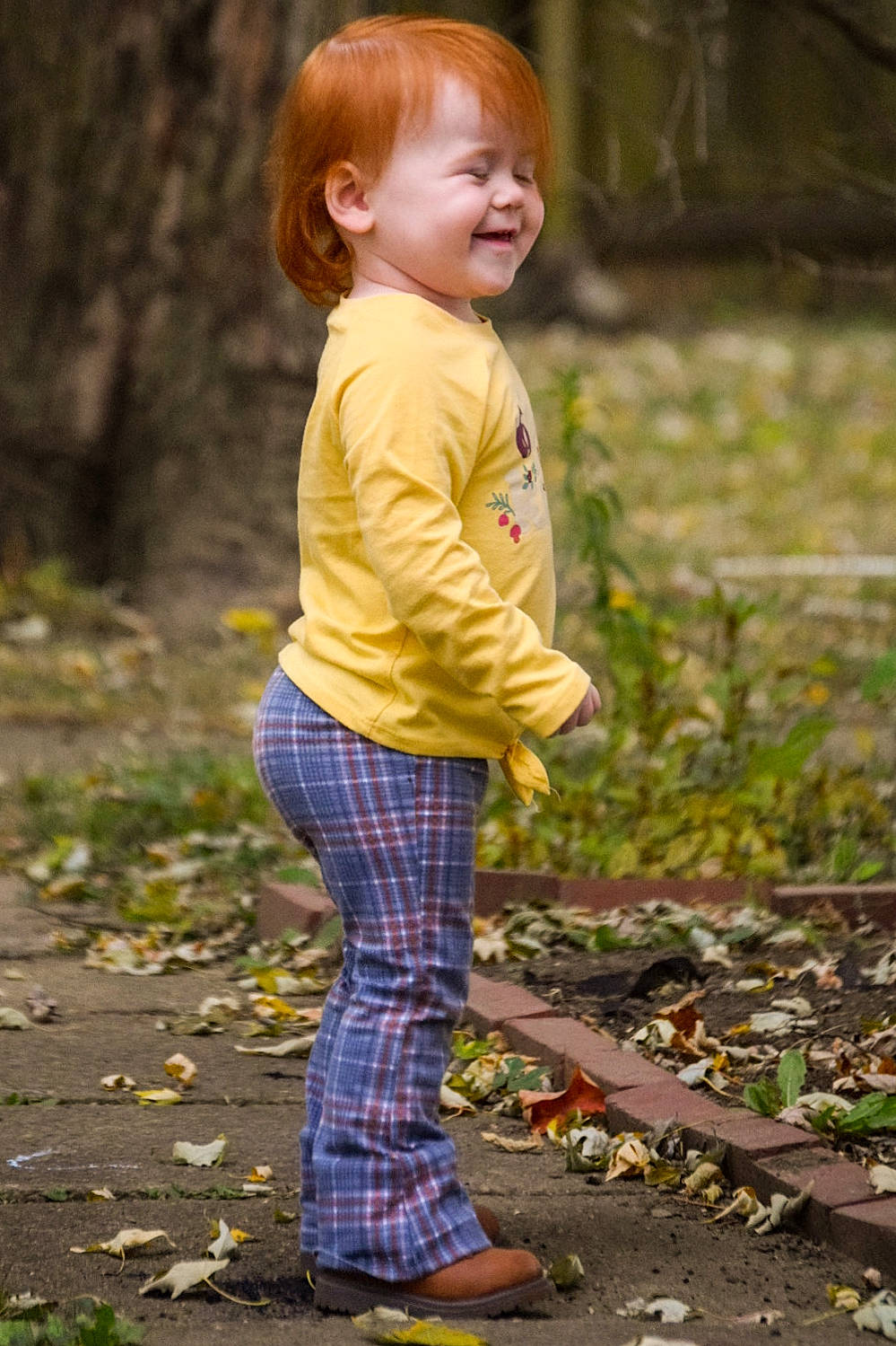 Presleigh joined the competition — help win amazing prizes! baby_toddler_clothing, beauty, child, deciduous, face, forest, grass, happy, leaf, pattern, people_in_nature, person, photograph, plaid, plant, sleeve, smile, tartan, toddler, tree