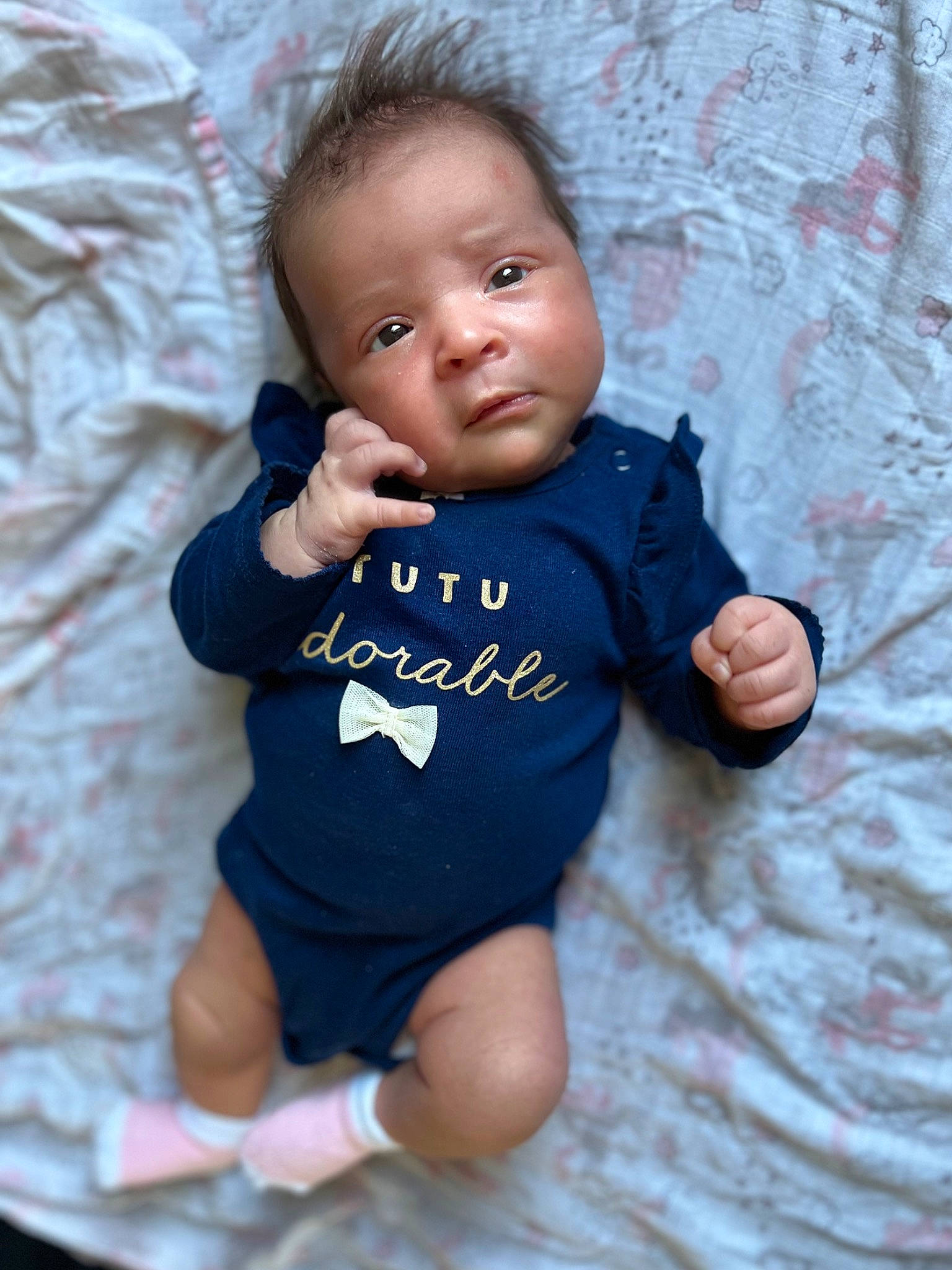 Malia joined the competition — help win amazing prizes! arm, azure, baby_toddler_clothing, cheek, clothing, finger, flash_photography, gesture, hand, happy, human_body, iris, mammal, nose, person, product, skin, sleeve, standing, t_shirt