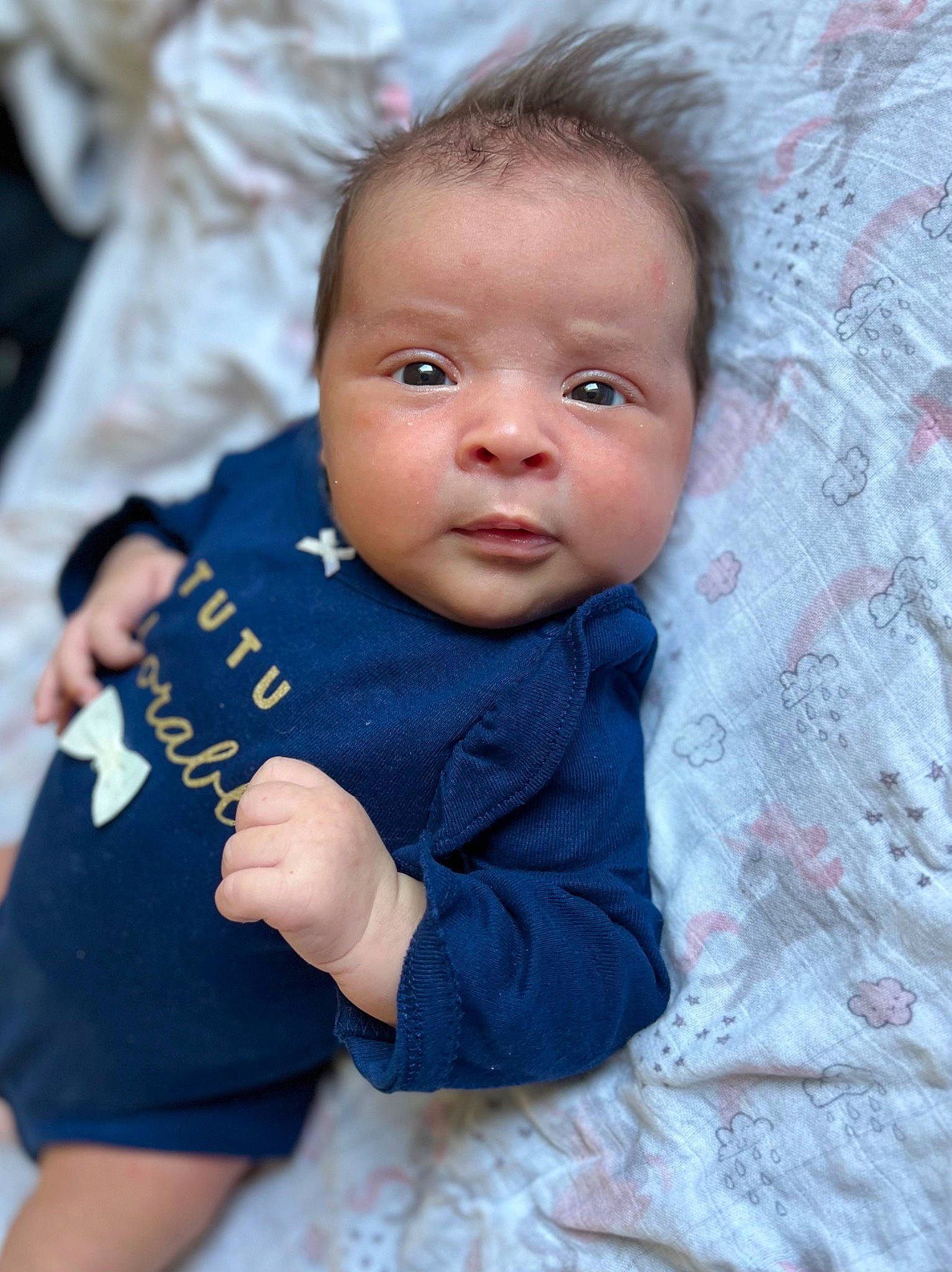 Malia is registered to the contest to win money with this photo: baby, baby_toddler_clothing, beauty, cheek, child, electric_blue, fur, gesture, grass, happy, head, linens, nose, person, portrait_photography, sitting, skin, sleeve, toddler, tree