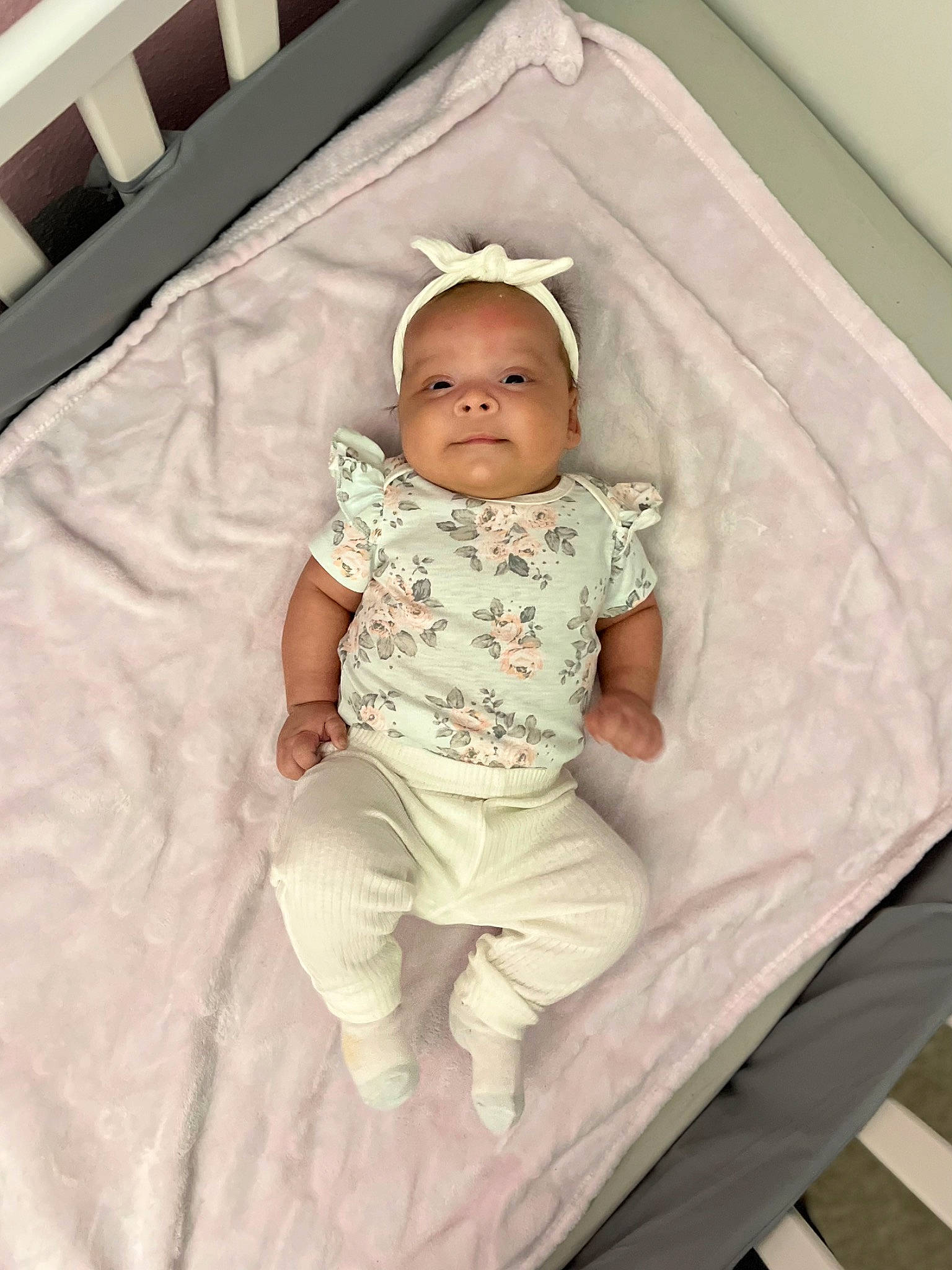 Malia is registered to the contest to win money with this photo: baby, baby_products, baby_safety, baby_sleeping, baby_toddler_clothing, child, comfort, eye, fun, head, infant_bed, linens, pattern, person, room, sitting, skin, sleeve, t_shirt, toddler