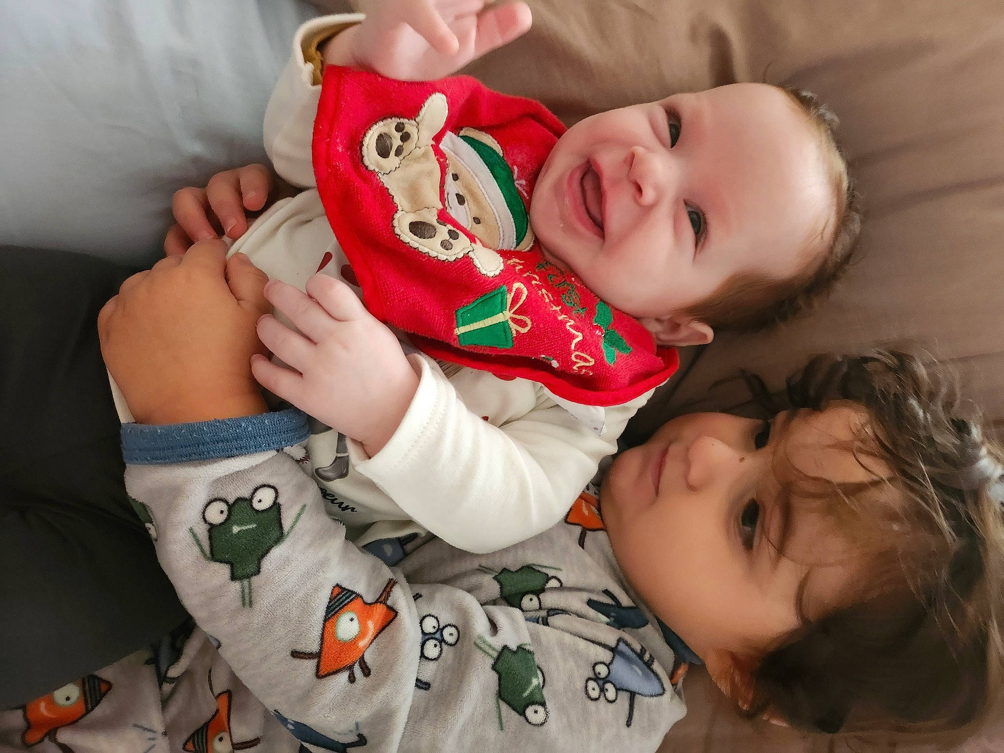 Aliyah participe au concours pour gagner de l'argent avec cette photo : baby, baby_toddler_clothing, cheek, child, comfort, face, finger, happy, human_body, lip, mouth, nose, pattern, person, sitting, skin, sleeve, smile, textile, toddler