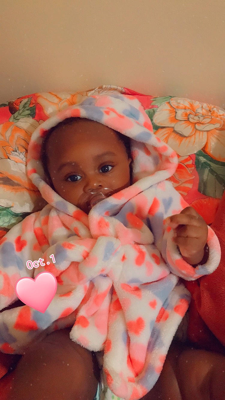 Adora is registered to the contest to win money with this photo: baby, child, peach, person, pink, textile, toddler