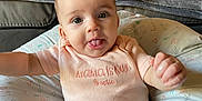 Aurora joined the competition — help win amazing prizes! baby, babylaughing, bed, bedroom, clothing, couch, cushion, face, furniture, happy, head, homedecor, indoors, person, photography, portrait, room, sitting, smile, t_shirt