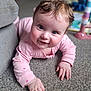 Edith joined the competition — help win amazing prizes! baby, infant, crawling, pink_clothing, carpet, indoor, smiling, child, cute, closeup, face, hand, floor, home, person, young_child, playful, curious, soft_light, living_room
