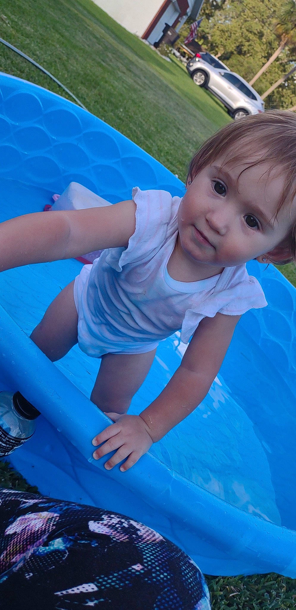 Daisy joined the competition — help win amazing prizes! aqua, azure, blue, dress, elbow, electric_blue, fun, grass, green, happy, human_body, human_leg, leisure, people_in_nature, person, recreation, sitting, smile, t_shirt, thigh