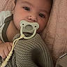 Luca joined the competition — help win amazing prizes! baby, pacifier, blanket, knitted_cloth, infant, cute, face, sleeping_area, soft_texture, comfort, close_up, child, indoors, person, resting, young_child, cozy, hand, portrait, warm