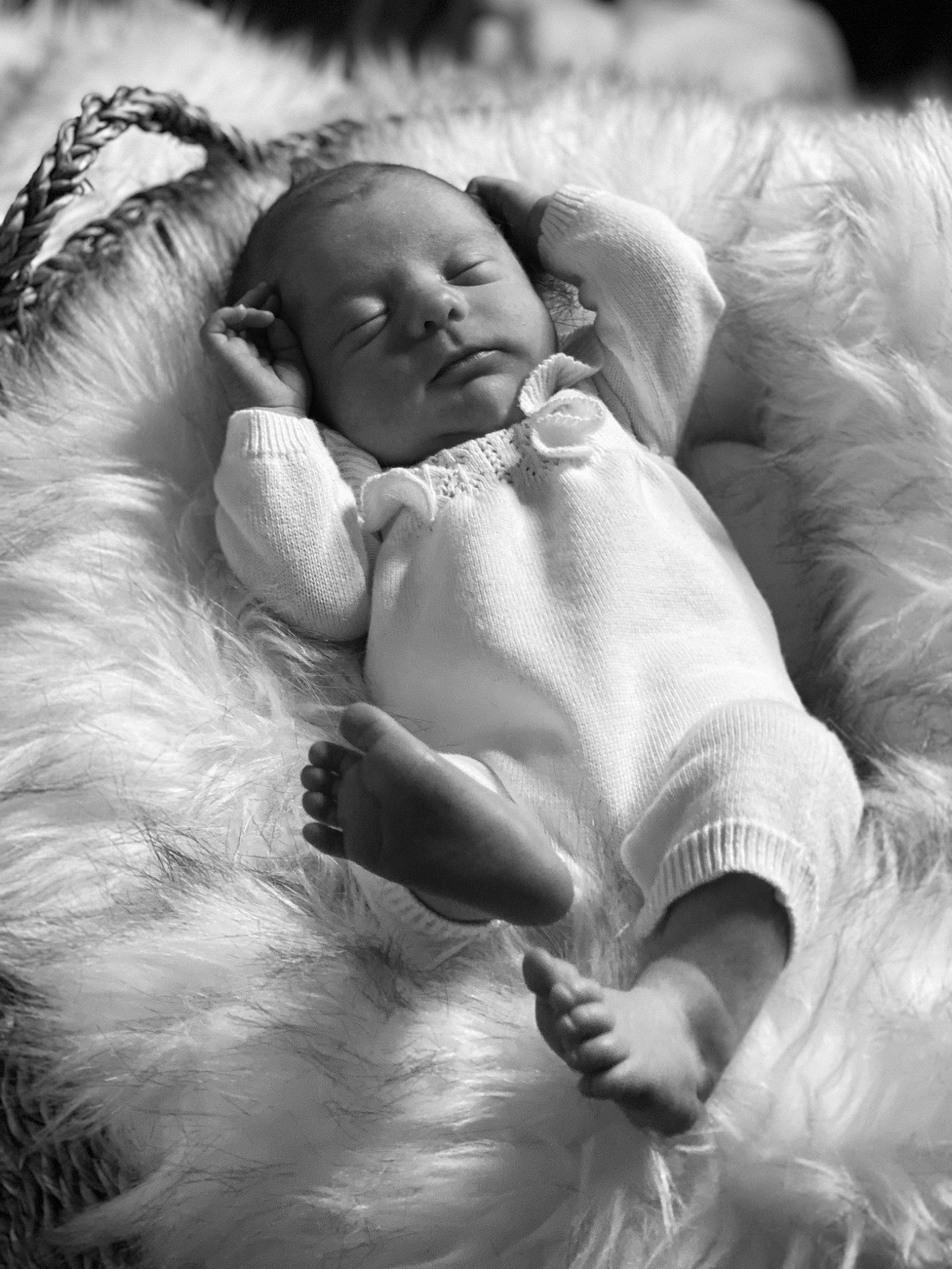 Gia is registered to the contest to win money with this photo: baby, birth, black_and_white, child, gesture, hand, happy, monochrome, monochrome_photography, person, photograph, photography, portrait_photography, smile, stock_photography, style, toddler