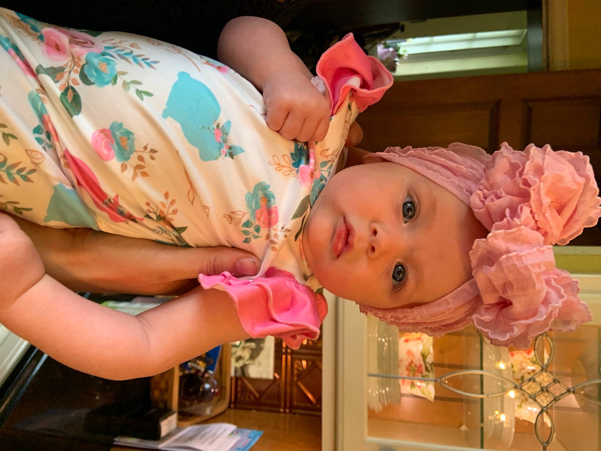 Charlotte is registered to the contest to win money with this photo: baby, baby_products, baby_toddler_clothing, cheek, child, eye, eyelash, fun, happy, headwear, nose, party, peach, person, petal, pink, room, rose, skin, sweetness