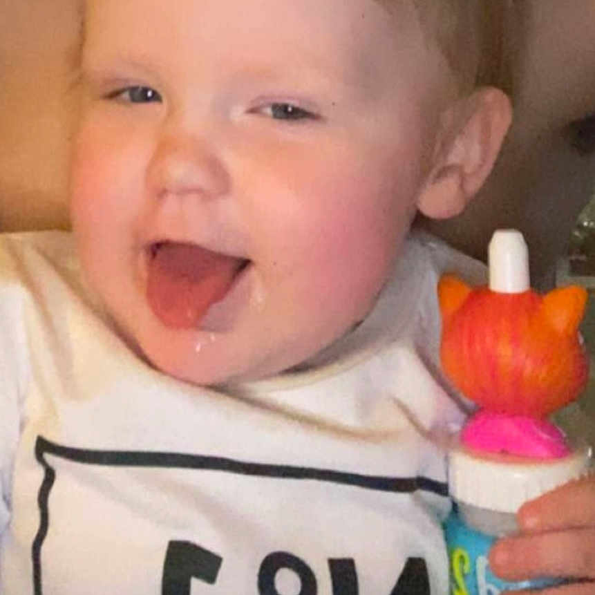 Kya is registered to the contest to win money with this photo: baby, bodypart, clothing, cream, cutlery, dessert, face, food, happy, head, icecream, icing, mouth, person, photography, plant, portrait, spoon, t_shirt, teeth