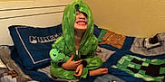 Jaxson is registered to the contest to win money with this photo: architecture, baby, bed, bedroom, blanket, building, clothing, coat, face, furniture, head, hood, indoors, jacket, outdoors, person, photography, portrait, room, shelter