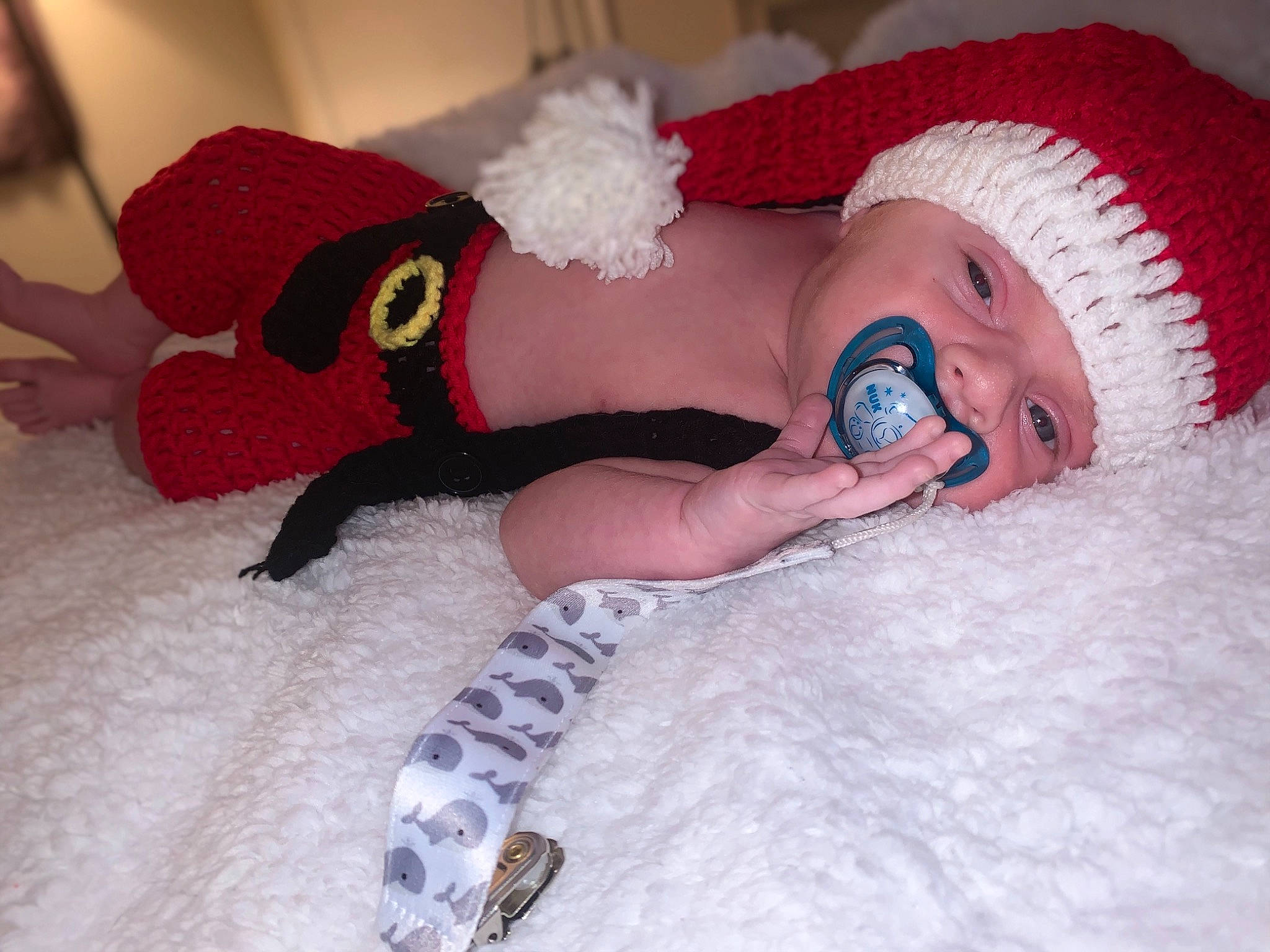 Landon joined the competition — help win amazing prizes! arm, baby, baby_sleeping, baby_toddler_clothing, cap, comfort, eye, hand, hat, head, headgear, human_body, leg, person, pink, skin, sock, stuffed_toy, thigh, toddler