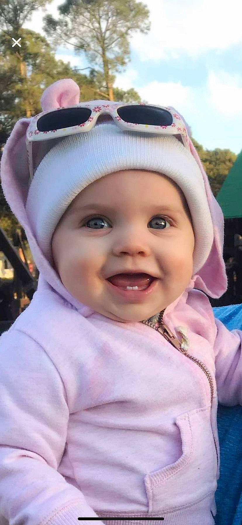 Eliza is registered to the contest to win money with this photo: baby, cheek, child, ear, face, facial_expression, forehead, hair_accessory, happy, head, headgear, joy, laugh, nose, person, skin, smile, toddler
