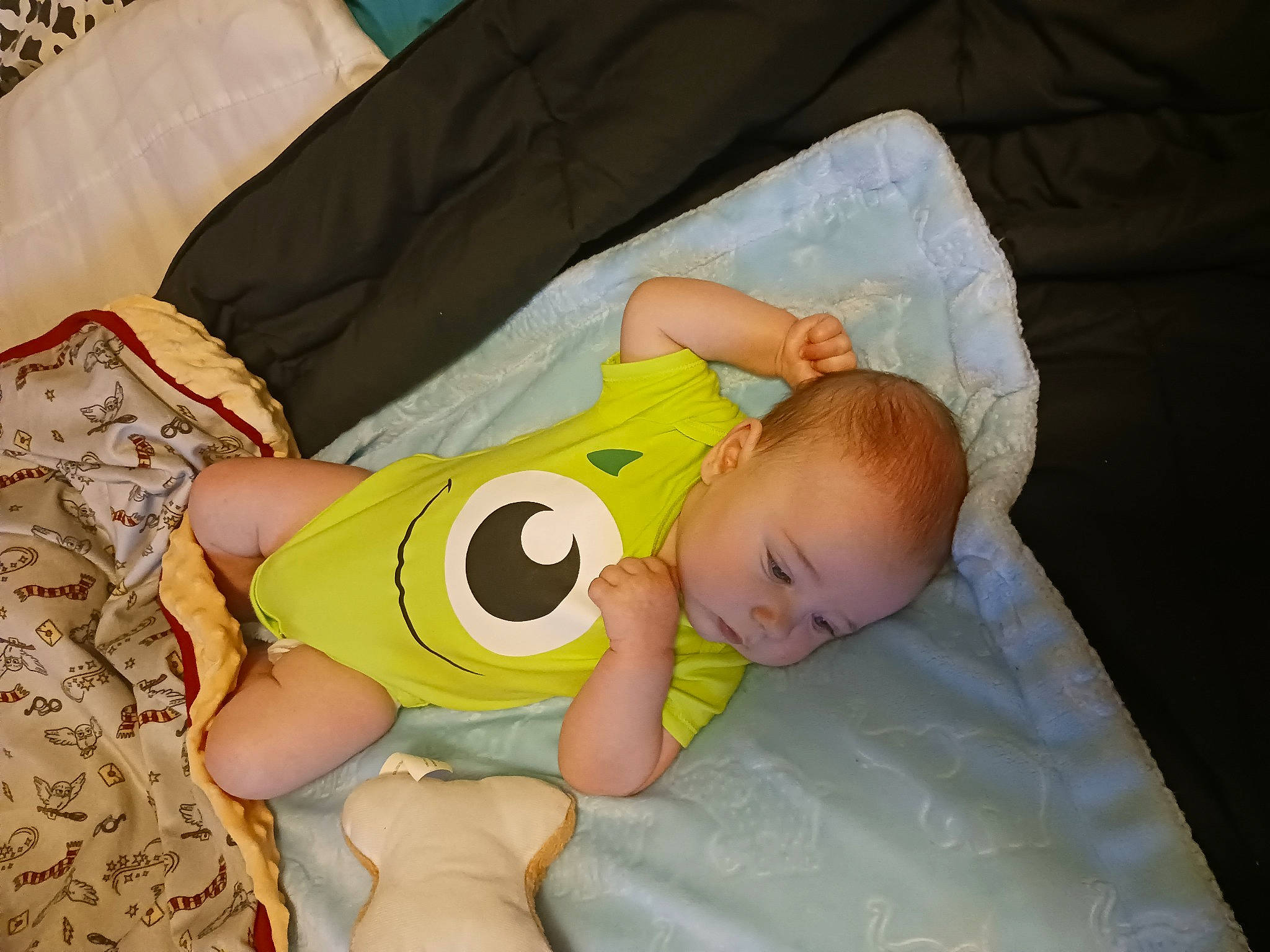 Thomas is registered to the contest to win money with this photo: abdomen, baby, baby_products, baby_safety, baby_sleeping, baby_toddler_clothing, bedtime, child, comfort, elbow, foot, human_body, human_leg, infant_bodysuit, knee, linens, pattern, person, room, thigh