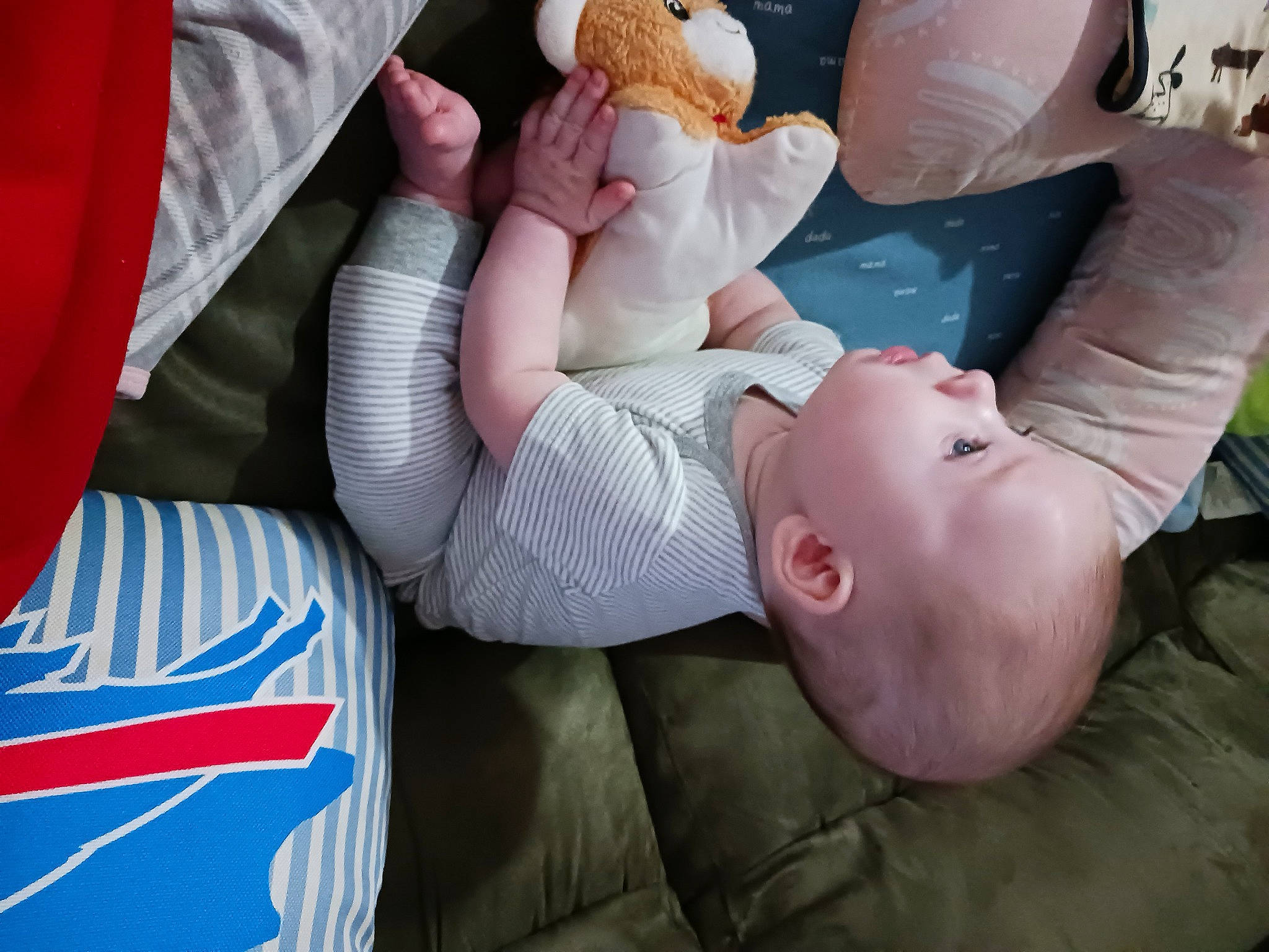 Thomas is registered to the contest to win money with this photo: arm, baby, baby_products, baby_sleeping, carmine, child, comfort, finger, gesture, hat, human_body, human_leg, joint, knee, linens, mouth, nail, person, textile, thumb