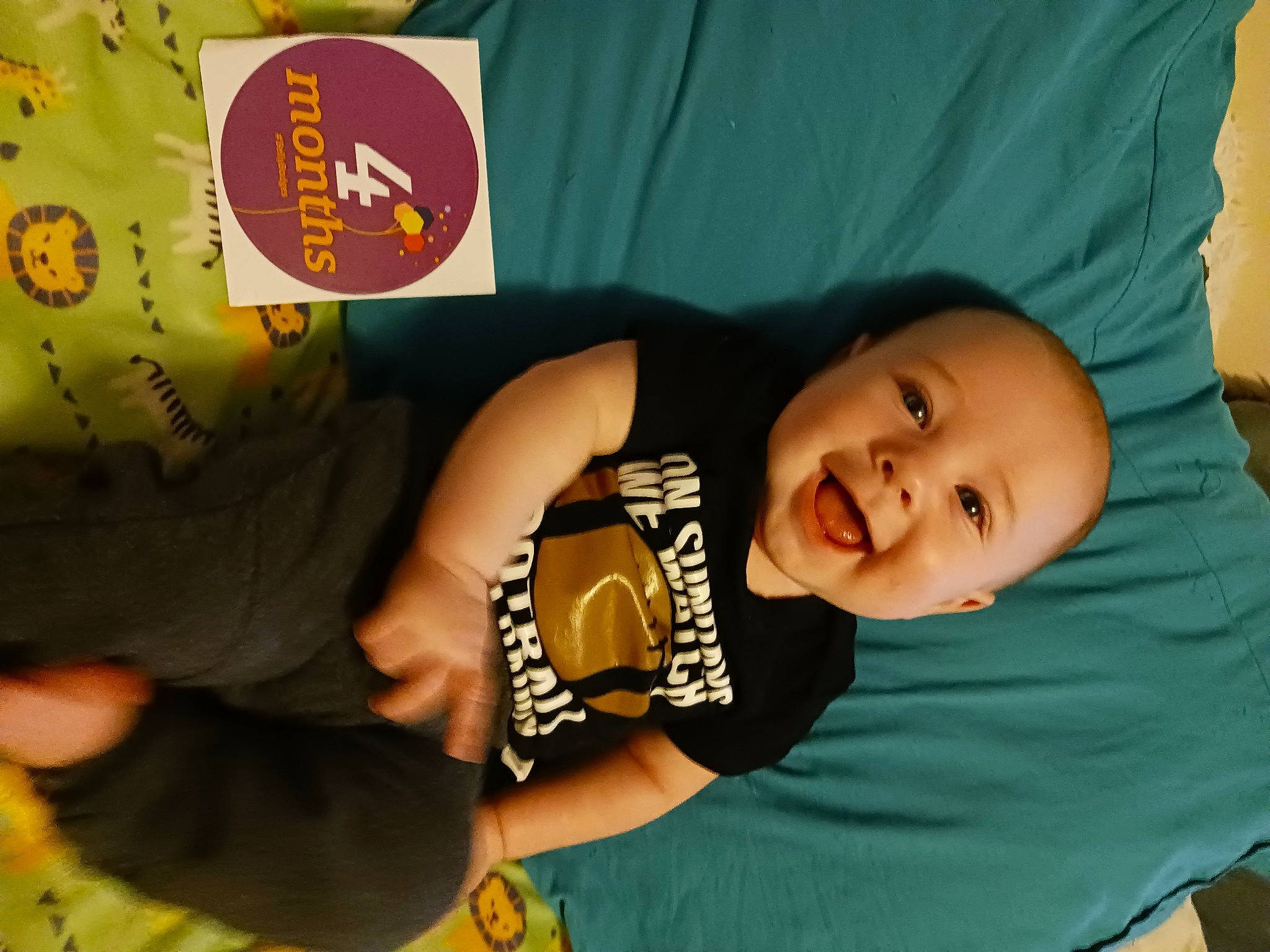 Thomas is registered to the contest to win money with this photo: baby, baby_toddler_clothing, cheek, child, comfort, elbow, finger, fun, happy, joy, leisure, logo, person, play, product, room, sitting, sleeve, smile, t_shirt