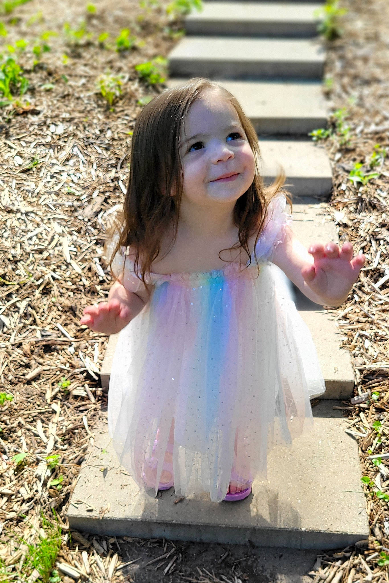 Ellie joined the competition — help win amazing prizes! botany, clothing, day_dress, dress, eye, face, grass, green, hair, happy, head, iris, joy, leaf, people_in_nature, person, pink, plant, smile, toddler