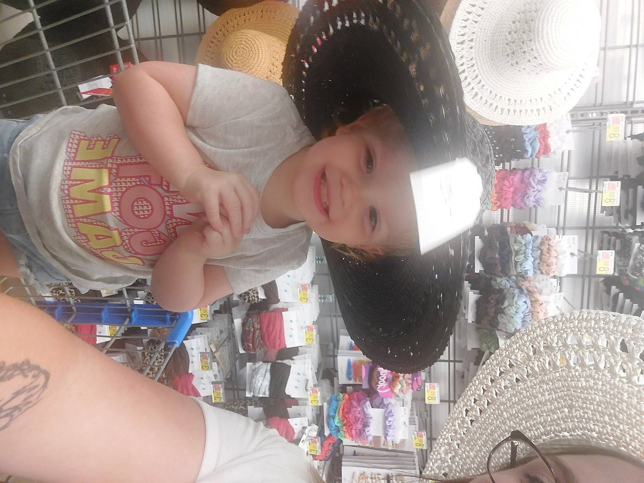 Xena is registered to the contest to win money with this photo: arm, beauty, black_hair, cool, elbow, fashion_accessory, fun, hairstyle, hat, headwear, human_leg, joy, light, mechanical_fan, mouth, organ, pattern, person, photograph, temporary_tattoo