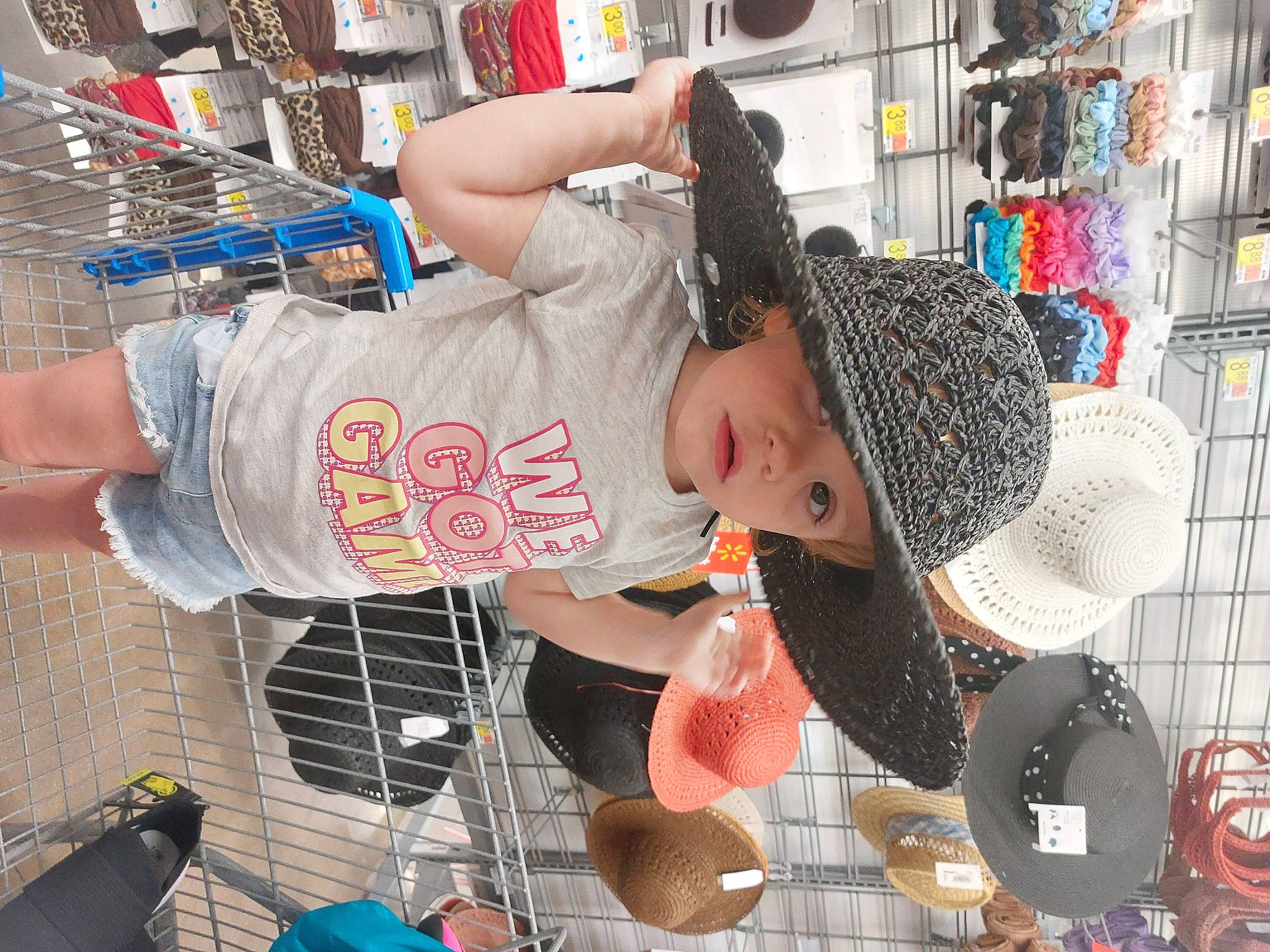 Xena joined the competition — help win amazing prizes! blue, cap, child, customer, fashion, fashion_accessory, fun, hat, headwear, leisure, pattern, person, public_space, retail, selling, shopping, street, street_fashion, sun_hat, t_shirt