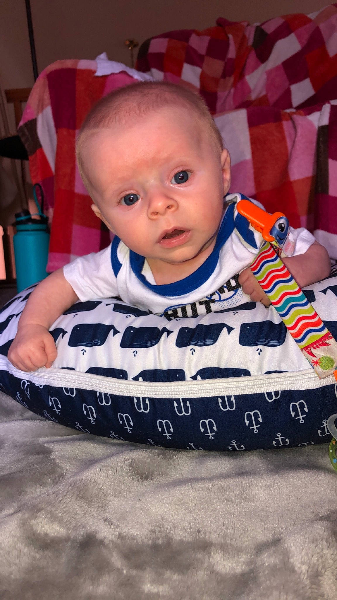 Deklan is registered to the contest to win money with this photo: baby, cheek, child, person, play, product, smile, surprise, toddler, tummy_time