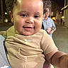 Tru joined the competition — help win amazing prizes! toddler, child, smiling, curly_hair, beige_outfit, person, night, outdoor, street, adult, holding, happy, portrait, urban, sidewalk, casual_clothing, people, face, cute, baby