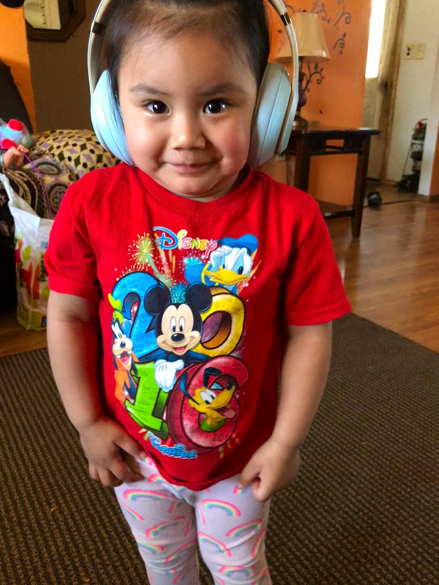 Juliet is registered to the contest to win money with this photo: child, ear, face, fictional_character, head, joy, person, play, sleeve, smile, t_shirt, toddler, top