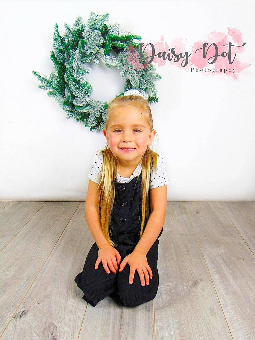Lola-rose joined the competition — help win amazing prizes! baby_toddler_clothing, child, child_model, costume, fashion_accessory, floor, flooring, hair_accessory, happy, joy, pattern, person, sitting, sleeve, smile, t_shirt, toddler, wood_flooring