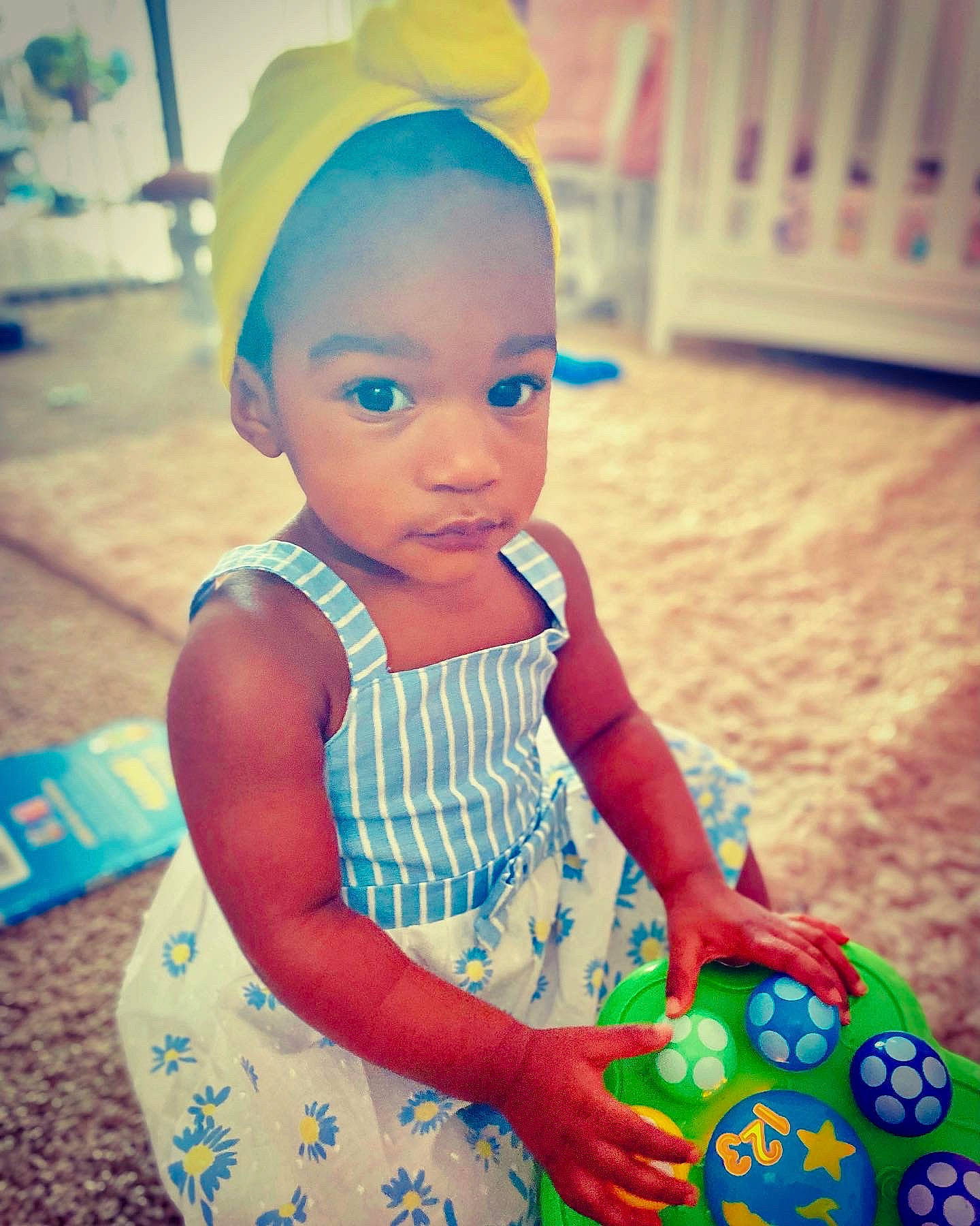 Jazlynn joined the competition — help win amazing prizes! baby, baby_playing_with_toys, baby_toddler_clothing, blue, child, dress, electric_blue, facial_expression, fun, happy, human, leisure, light, people, person, photograph, pink, skin, snapshot, summer