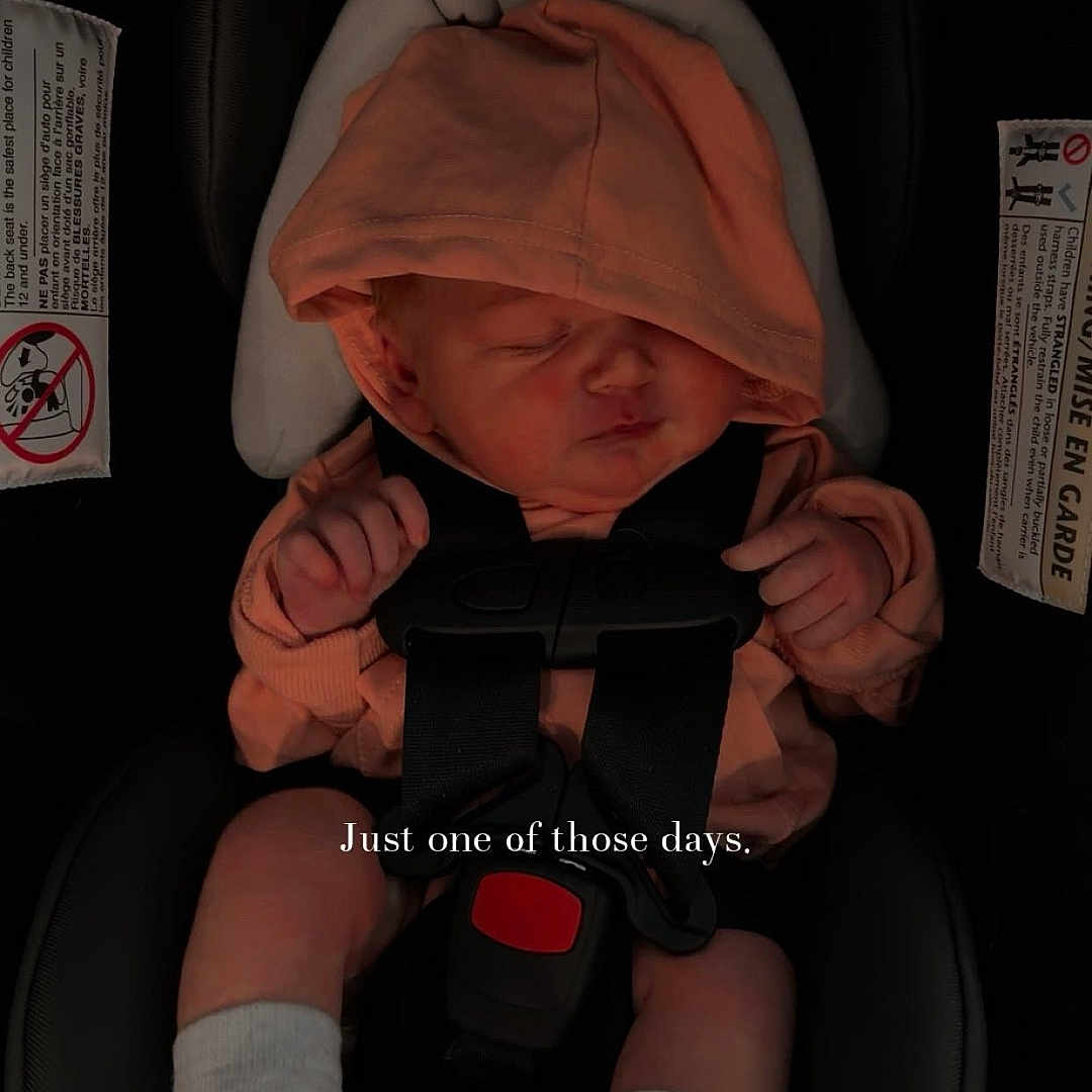 Bristol joined the competition — help win amazing prizes! baby, infant, car_seat, hoodie, sleeping, white_socks, child, seatbelt, evenflo, indoors, cute, peaceful, newborn, resting, small_hands, tiny_feet, text_overlay, black_background, soft_lighting, casual_clothing
