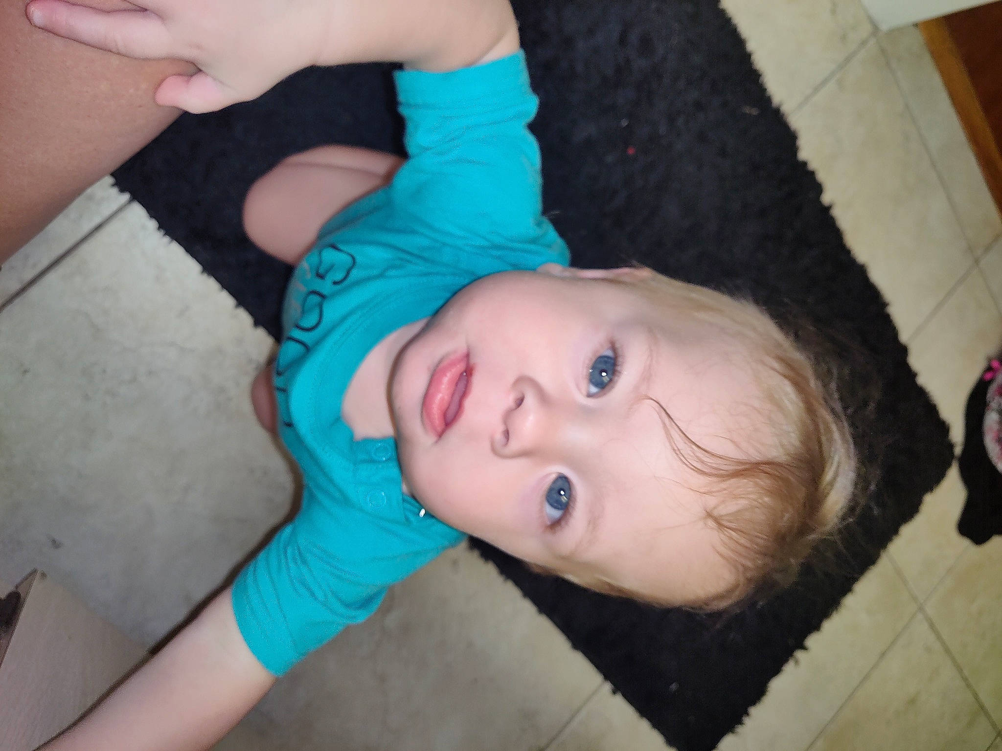 Titus is registered to the contest to win money with this photo: baby, baby_toddler_clothing, cheek, chin, ear, electric_blue, eyebrow, eyelash, finger, gesture, hand, happy, iris, lip, mouth, neck, nose, person, skin, thumb