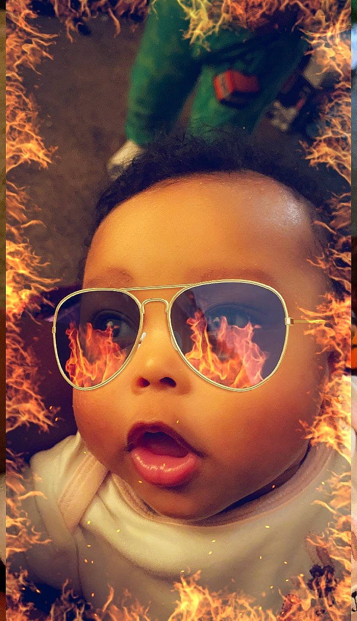 Destany is registered to the contest to win money with this photo: art, baby, cheek, chin, close_up, cool, eye_glass_accessory, eyebrow, eyelash, eyewear, fun, goggles, happy, jaw, lip, nose, person, personal_protective_equipment, sunglasses, toddler