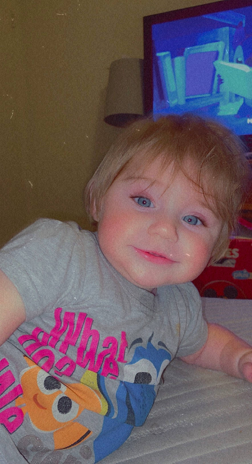 Selena is registered to the contest to win money with this photo: arm, baby_toddler_clothing, blue, cheek, chin, ear, eye, eyebrow, forehead, happy, head, iris, joy, lip, mammal, mouth, nose, organ, person, shoulder