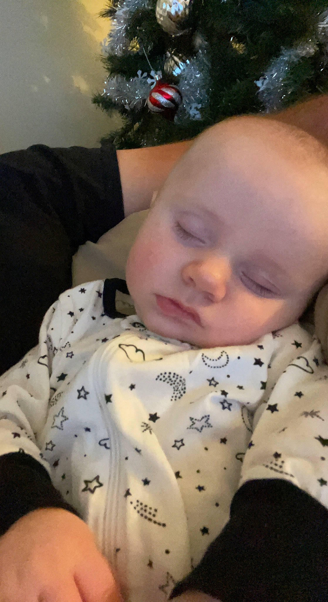 Joe joined the competition — help win amazing prizes! baby, baby_toddler_clothing, cheek, child, christmas_tree, comfort, eye, face, facial_expression, head, human_body, mammal, nose, organ, person, skin, sleeve, toddler, tree, vertebrate