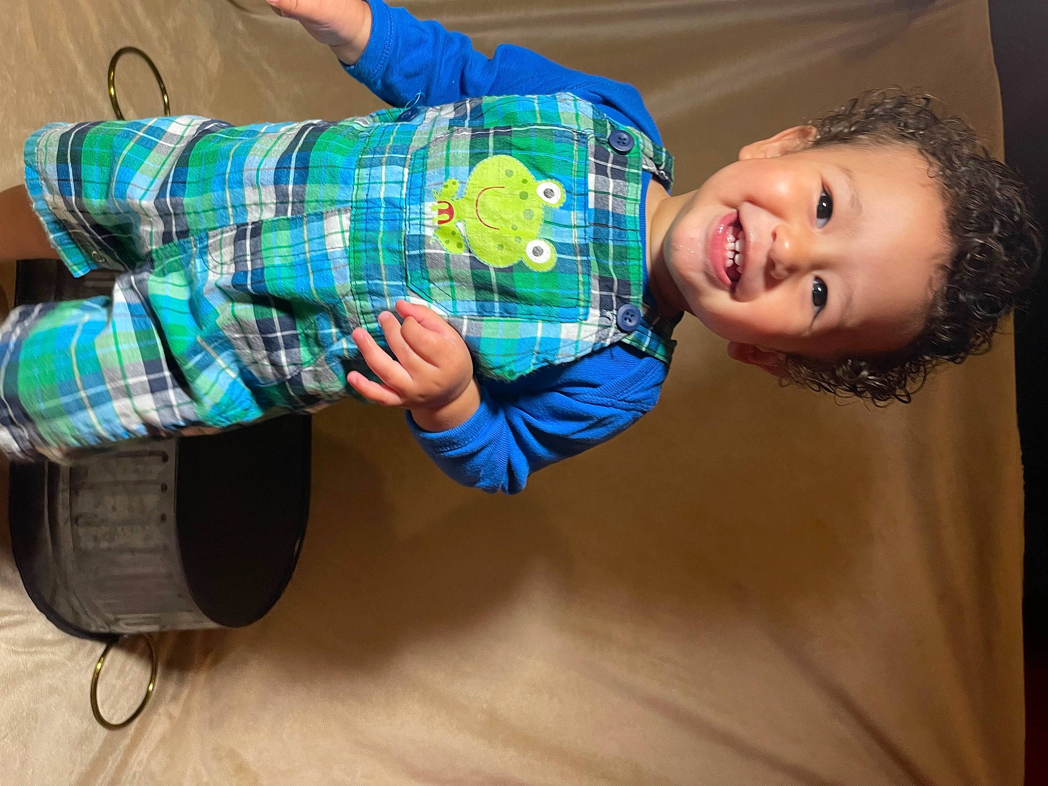 Milo joined the competition — help win amazing prizes! baby_products, baby_toddler_clothing, bag, blue, child, electric_blue, flash_photography, fun, happy, joy, knee, luggage_and_bags, pattern, person, plaid, sitting, sleeve, smile, sock, tartan